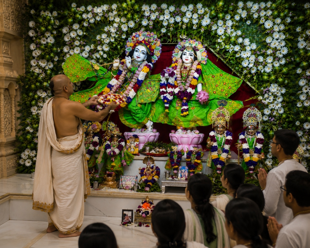 Temple Priest offering Arati to Sri Sri Radha Krishna Chandra
